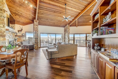 Stunning lakefront home with 2 patios, chef's kitchen, & lake access