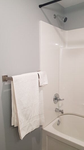 Hair dryer, towels, soap, shampoo