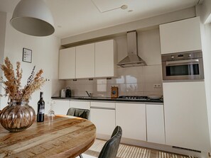 Fridge, microwave, dishwasher, high chair