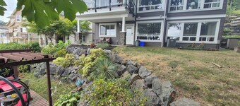 Scenic 2 bedroom walkout suite with hot-tub and outdoor pool, across from Park.