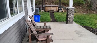 Scenic 2 bedroom walkout suite with hot-tub and outdoor pool, across from Park.