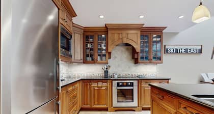 Ski-in/out mountainside condo with pool, hot tub, game room & washer/dryer