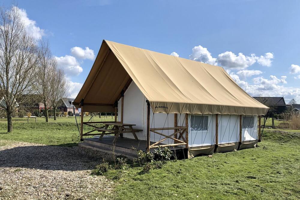 Nice tent lodge with veranda, 2 km from Ijhorst