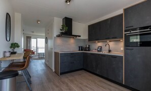 Microwave, stovetop, dishwasher, coffee/tea maker