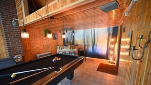 A pool table with balls, a wooden ceiling, and a mural of trees. - Chalet in Beffe with Hot Tub & Valley Views (Beffe)