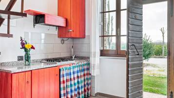 Fridge, stovetop, dining tables