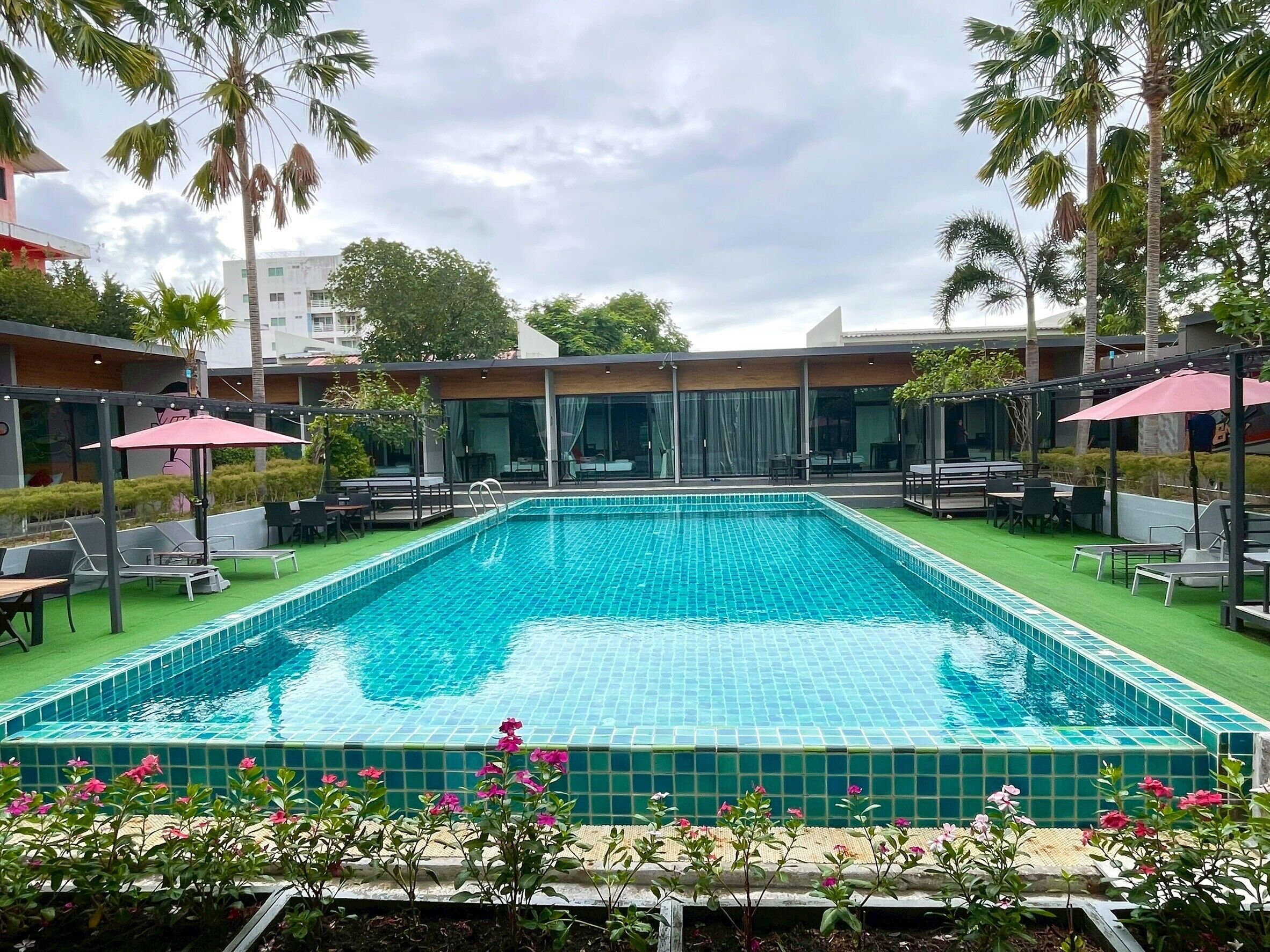 Outdoor pool, open 7:00 AM to 10:00 PM, free cabanas, pool umbrellas