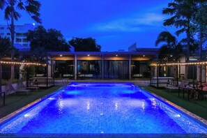 Outdoor pool, open 7:00 AM to 10:00 PM, free pool cabanas