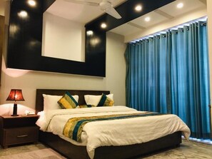 ห้องดีลักซ์ | เตารีด/โต๊ะรีดผ้า, Wi-Fi ฟรี, ผ้าปูที่นอน