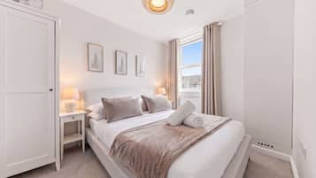 2 dormitorios, tabla de planchar con plancha, wifi gratis y ropa de cama