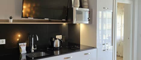 Fridge, microwave, dishwasher, coffee/tea maker