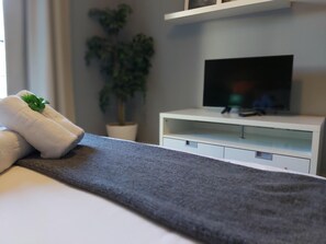 1 habitación, tabla de planchar con plancha y wifi gratis
