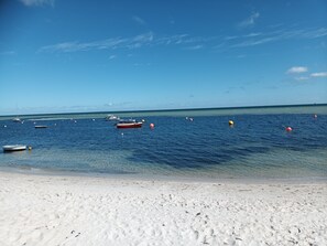 On the beach, sun loungers, beach towels