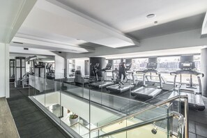 Work out with a city view at this gym featuring treadmills, stationary bikes, and weight machines.