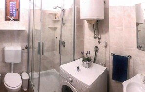 Ducha y secador de pelo