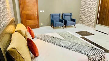 Habitación Deluxe doble | Tabla de planchar con plancha y wifi gratis