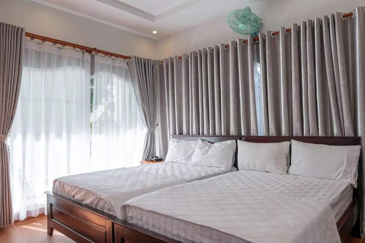 Chambre Quadruple Familiale, plusieurs lits, vue jardin, vue mer