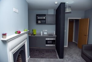 Microwave, dishwasher, toaster, cookware/dishes/utensils