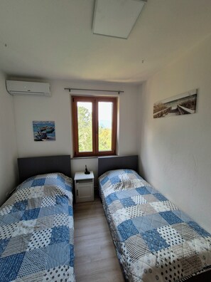 2 chambres, accès au Wi-Fi (inclus), literie fournie