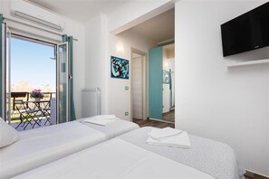 2 habitaciones, tabla de planchar con plancha, internet y ropa de cama 