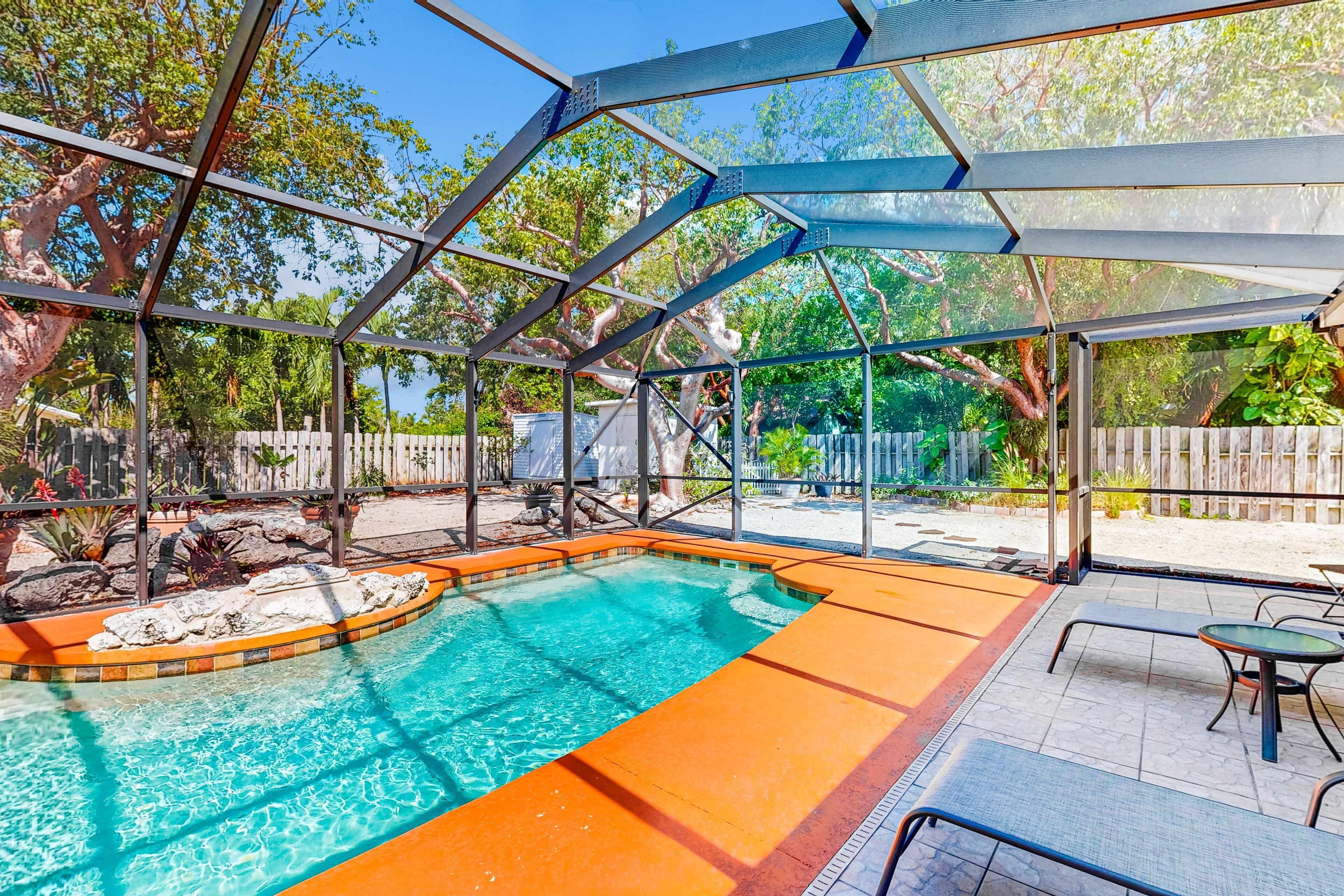 Single-level home with a private pool, enclosed yard - two dogs OK