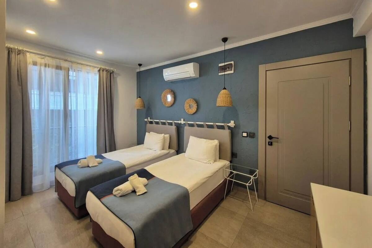 Luxe beddengoed, donsdekens, een minibar, een kluis op de kamer
