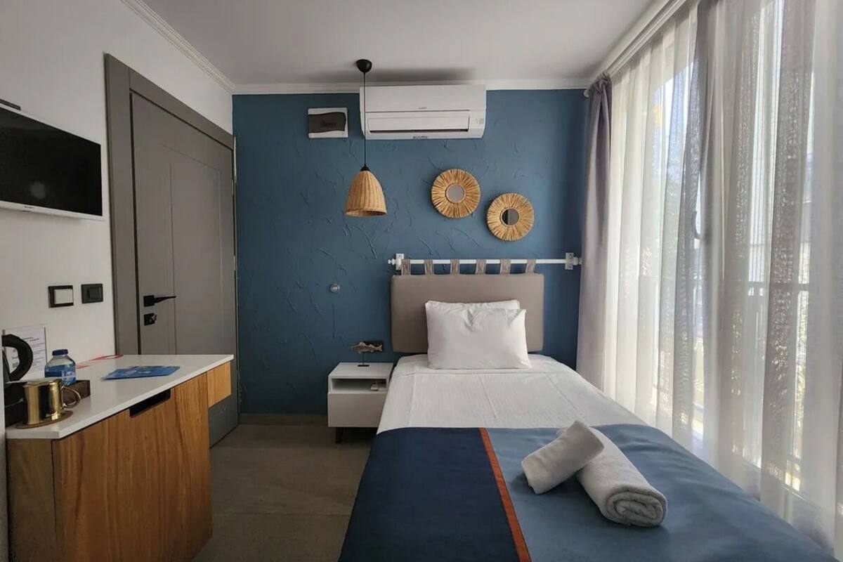 Luxe beddengoed, donsdekens, een minibar, een kluis op de kamer