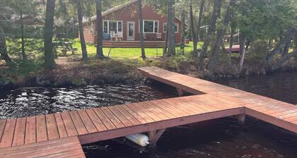 Dog-friendly lakefront cottage with private dock, firepit, grill & washer/dryer