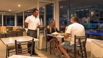 Breakfast, lunch, dinner served; Greek cuisine, beach views