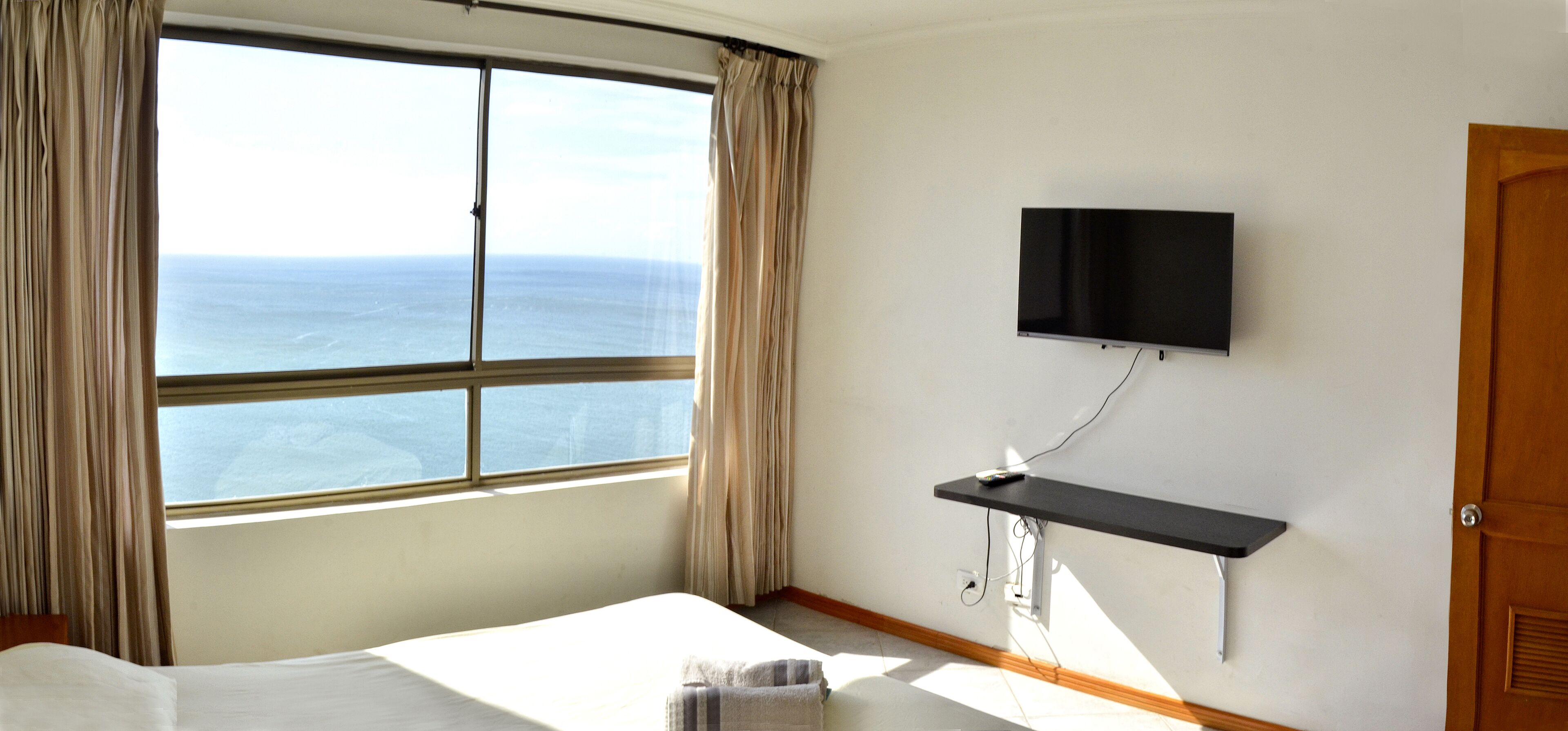 Desk, laptop workspace, free WiFi, bed sheets