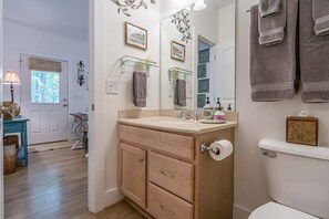 Shower, eco-friendly toiletries, hair dryer, bathrobes