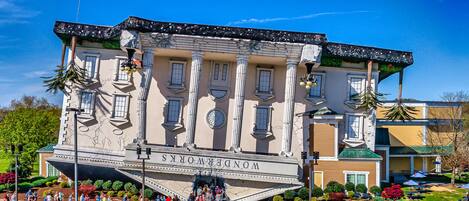A building with a large entrance and a sign reading "WonderWorks".