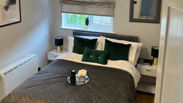 1 dormitorio, tabla de planchar con plancha, wifi gratis y ropa de cama