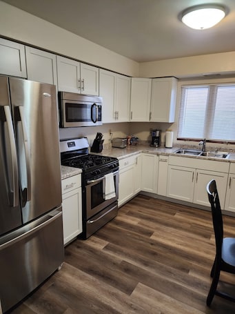 Fridge, microwave, oven, stovetop. Spacious 2 bedroom apartment
