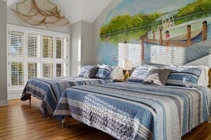 A bedroom with two beds, a mural of a boat on a river, and a large window with shutters. - Luxury Bayfront Retreat w/ Guest House, Game Room & 150 Ft Waterfront (Bradenton)