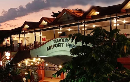 A building with a sign reading "DAVAO AIRPORT VIEW".