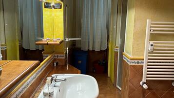 Hair dryer, towels, soap, shampoo