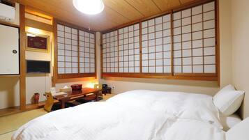 Basic-Doppel- oder -Zweibettzimmer | Schreibtisch, kostenloses WLAN, Bettwäsche