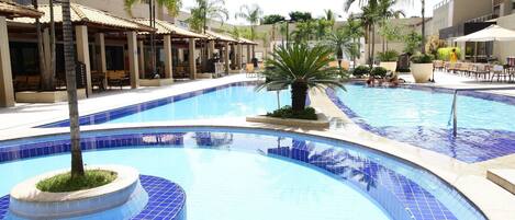 Outdoor pool, pool umbrellas, sun loungers