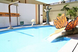 Outdoor pool, pool umbrellas, pool loungers