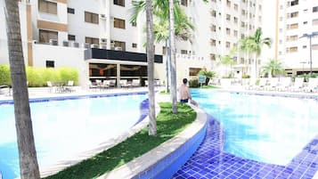 Outdoor pool, pool umbrellas, sun loungers