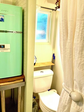Shower, towels, soap, toilet paper