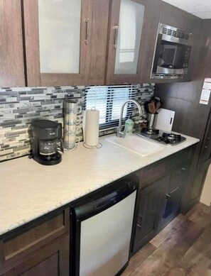 Fridge, microwave, coffee/tea maker, toaster
