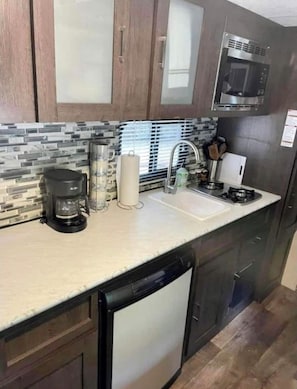 Fridge, microwave, coffee/tea maker, toaster