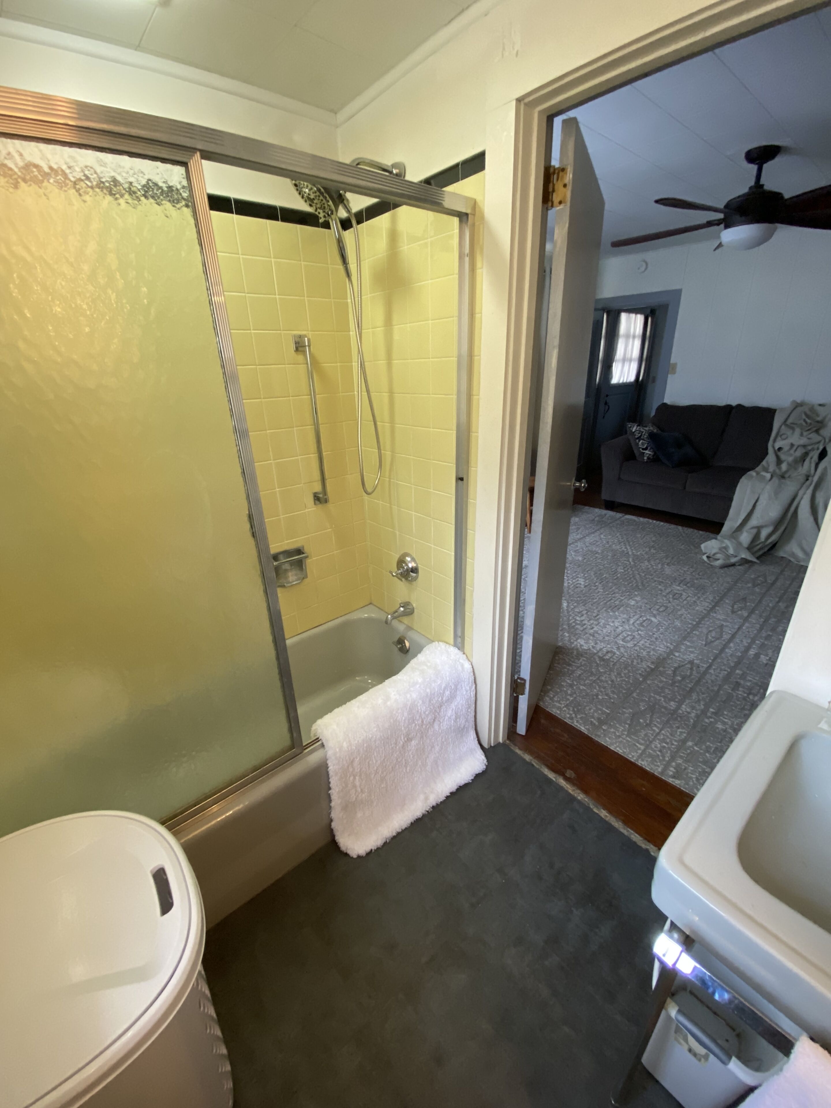 A bathroom with a bathtub, a shower, and a toilet.