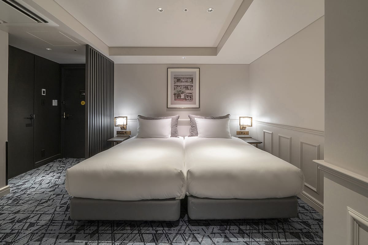 Deluxe Twin kamer, niet-roken (Quadruple) | Een kluis op de kamer, verduisterende gordijnen, gratis wifi, beddengoed