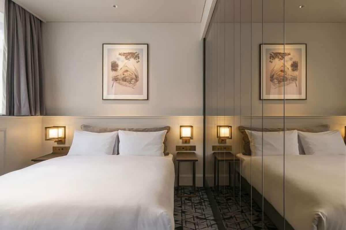 Een kluis op de kamer, verduisterende gordijnen, gratis wifi, beddengoed