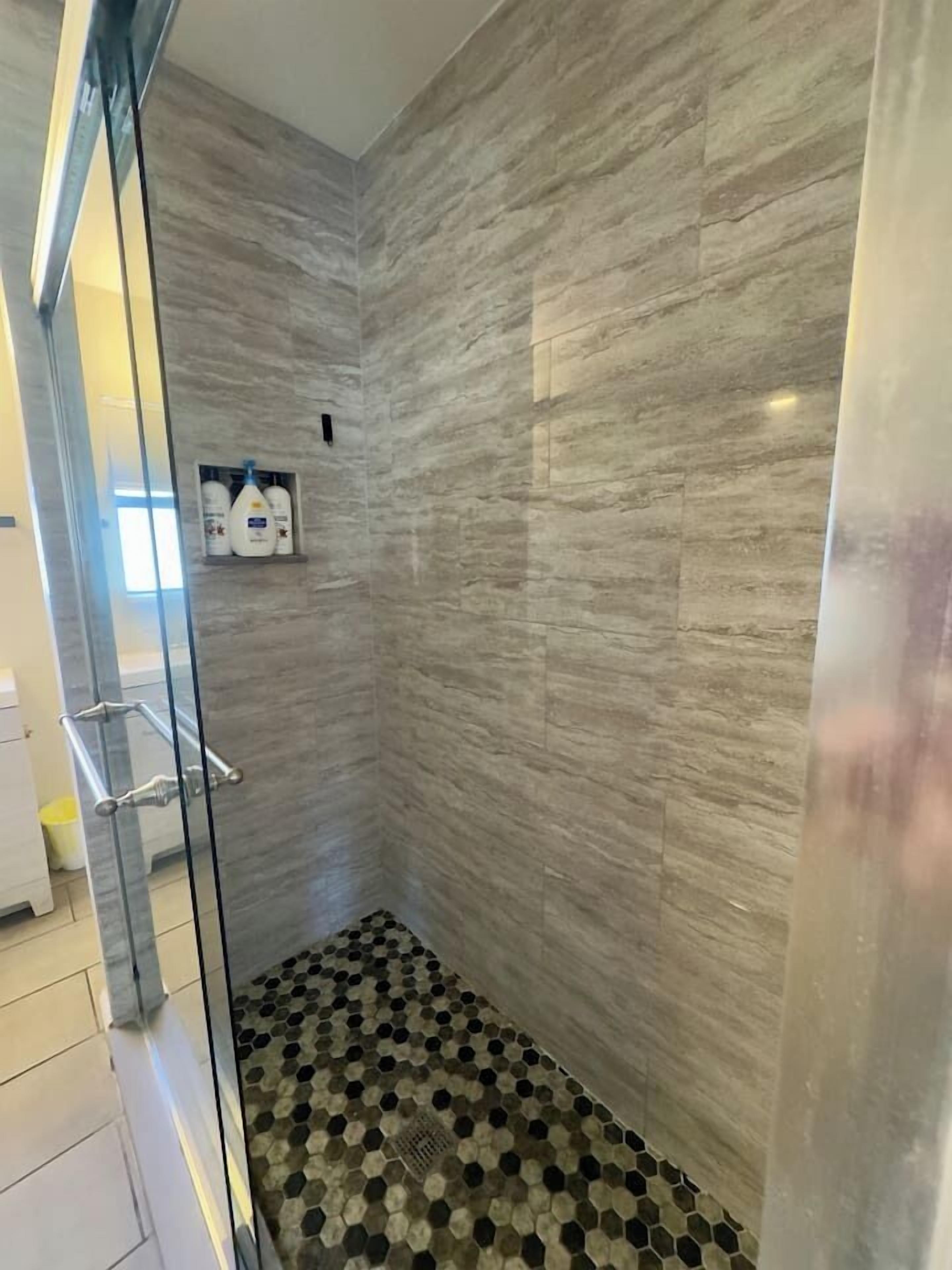 Shower, hair dryer, towels