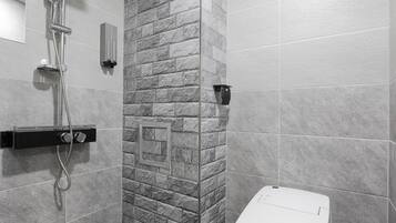 Deluxe Double Room | Bathroom | Shower, designer toiletries, hair dryer, bathrobes
