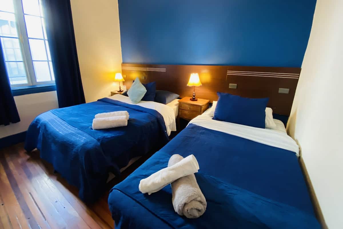 Family Room | 1 bedroom, minibar, WiFi (free), bed sheets
